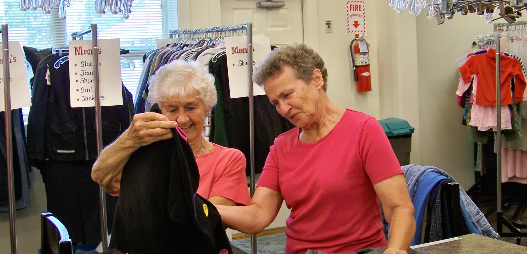 volunteers checking donated clothes